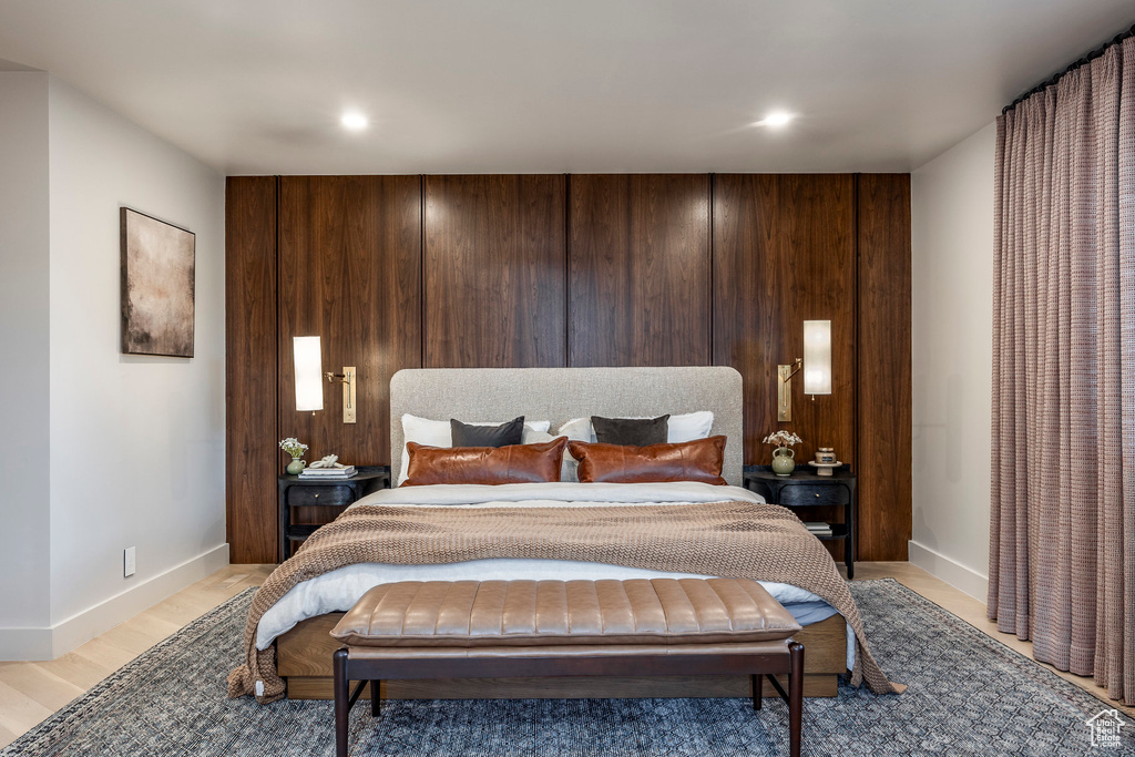 Bedroom featuring light wood-type flooring, recessed lighting, and baseboards