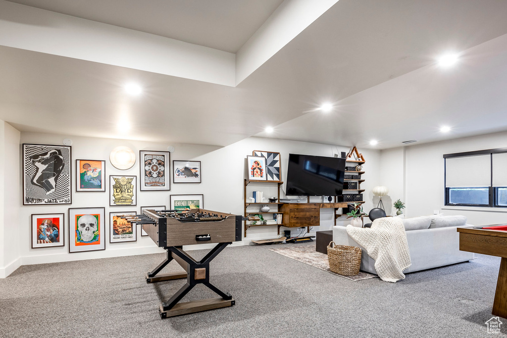 Living room featuring carpet and recessed lighting