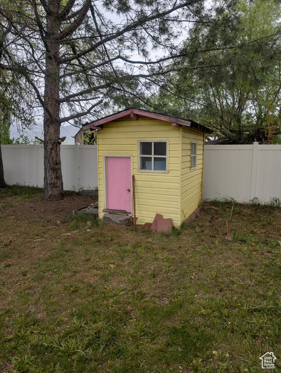 View of shed with fence