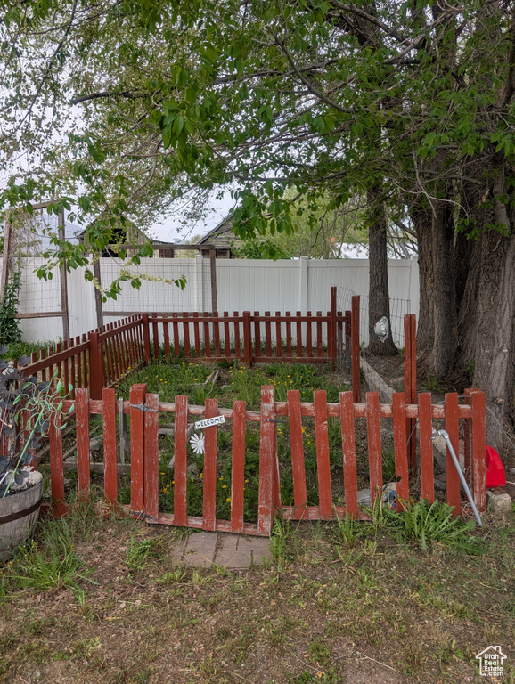 View of yard with fence