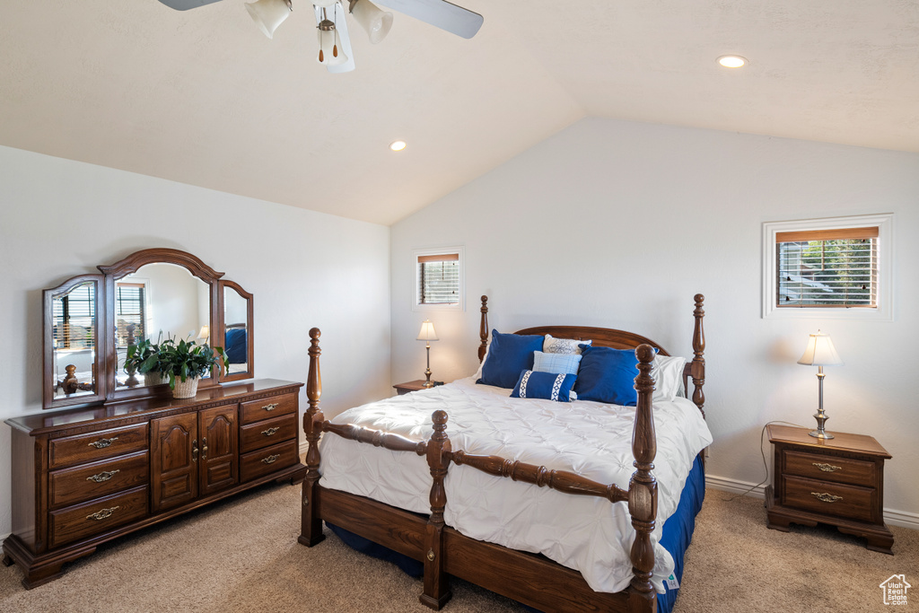 Bedroom featuring light colored carpet, lofted ceiling, recessed lighting, a ceiling fan, and baseboards