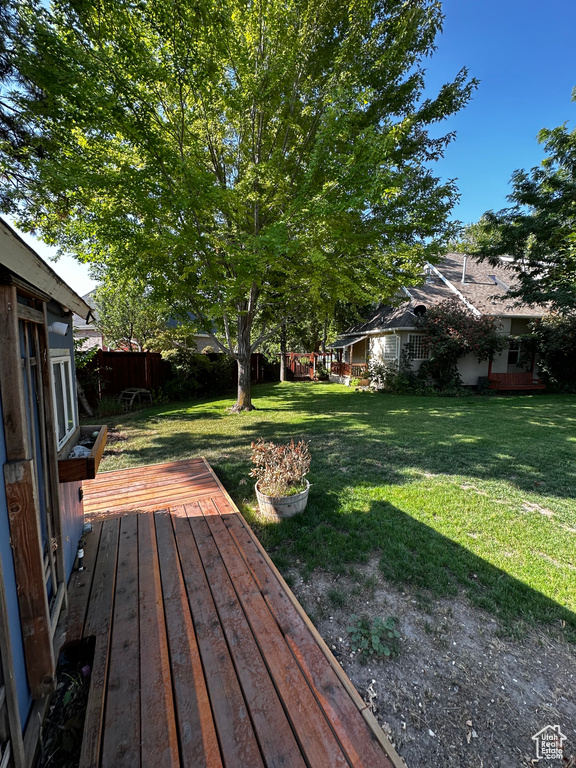 View of yard with a deck