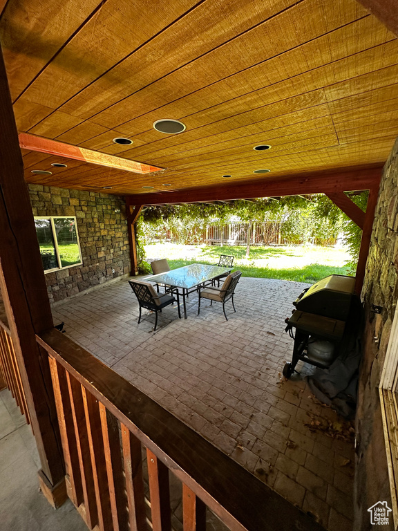 View of patio with outdoor dining space