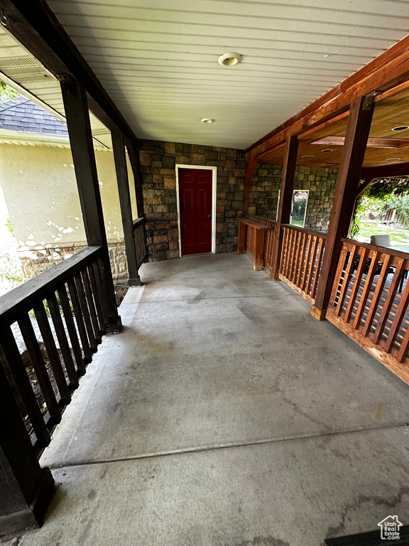 View of patio featuring covered porch