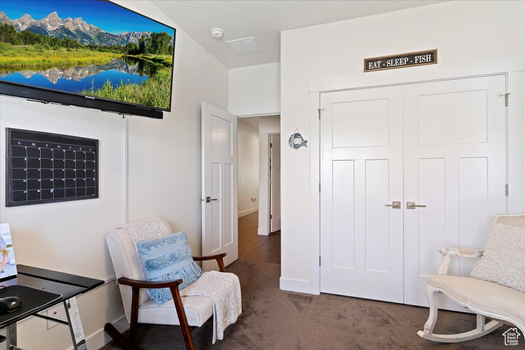 Living area featuring carpet floors