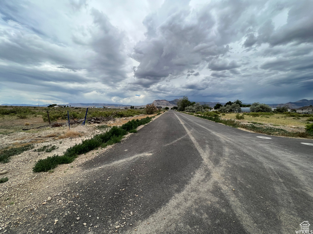 View of asphalt road with a mountain view