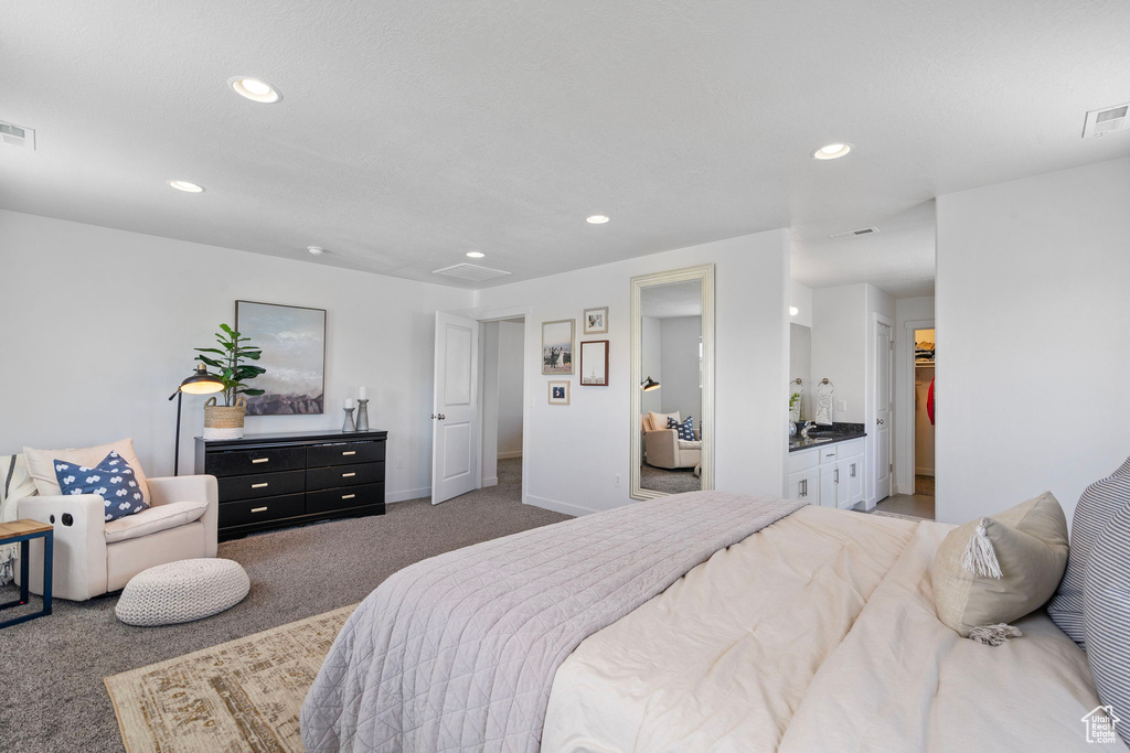 Bedroom featuring carpet, recessed lighting, and baseboards