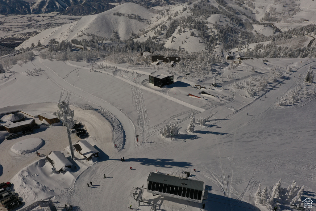 Snowy aerial view with a mountain view