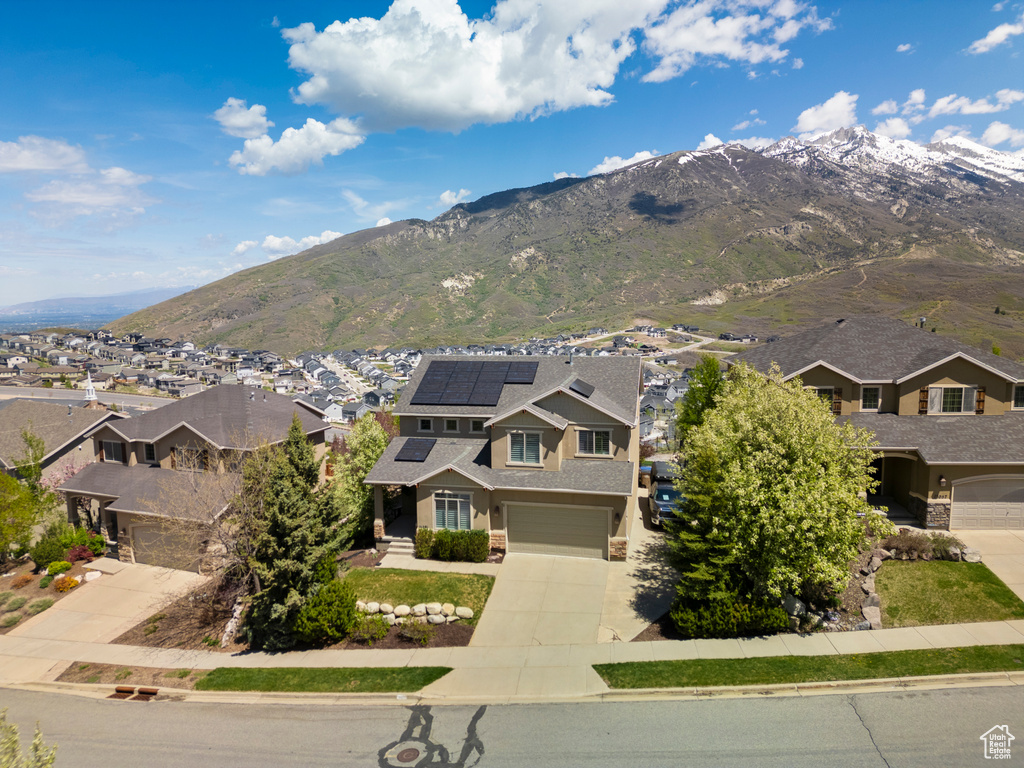 View of mountain backdrop with nearby suburban area