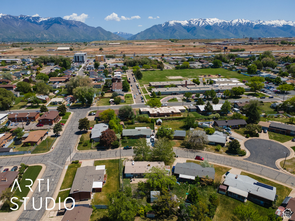 Aerial perspective of suburban area featuring mountains