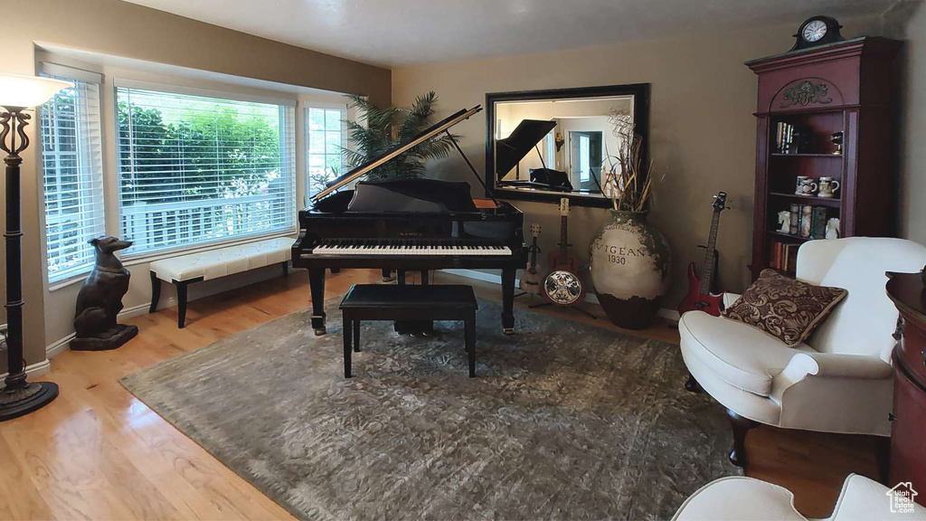 Living area featuring wood finished floors and baseboards