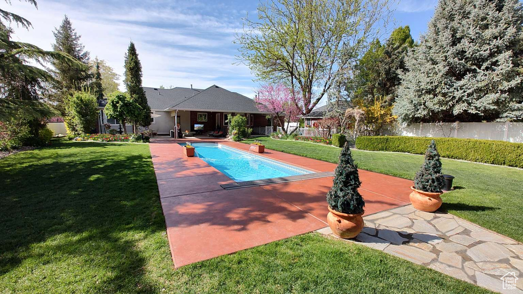View of pool featuring a patio area