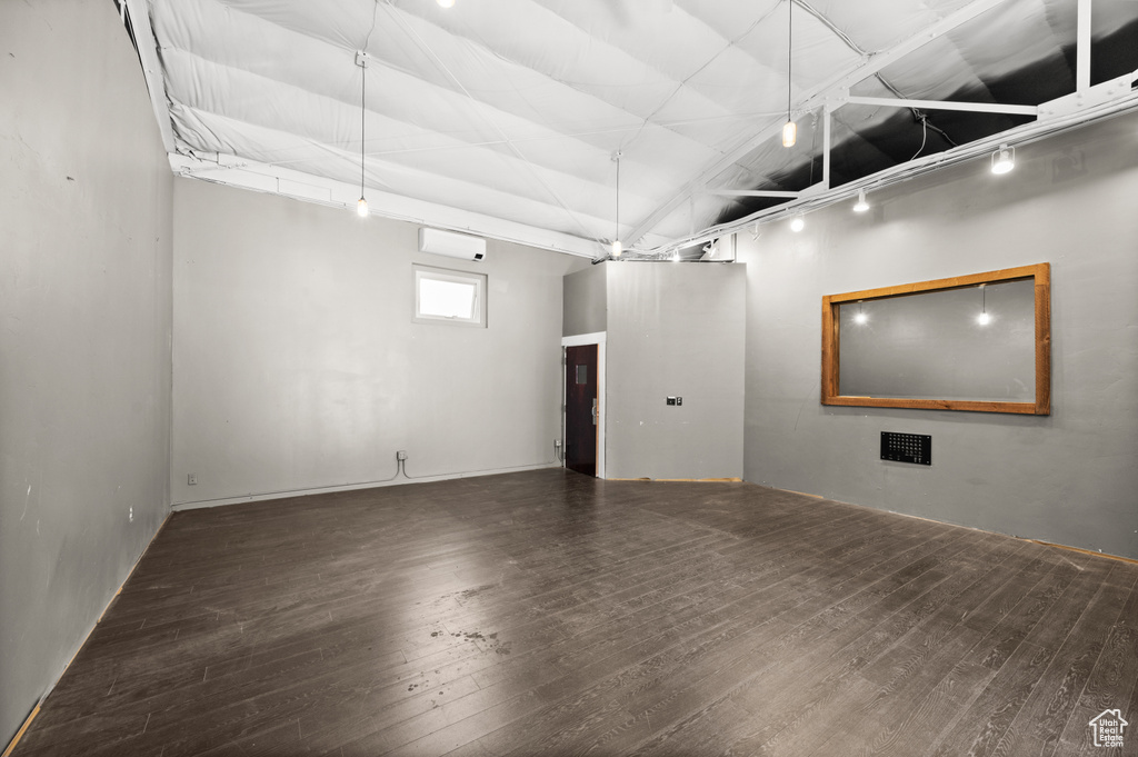 Basement featuring hardwood / wood-style flooring