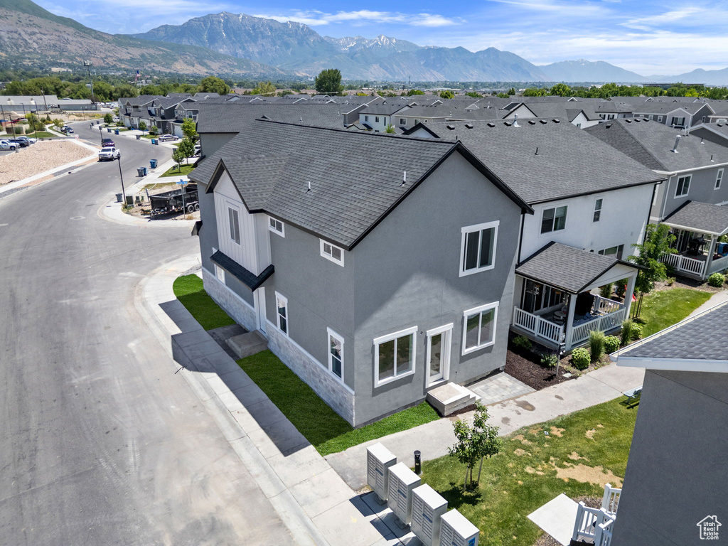 Aerial view of residential area with mountains