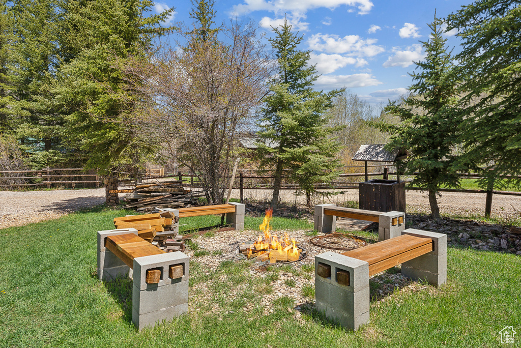 View of community with a fire pit