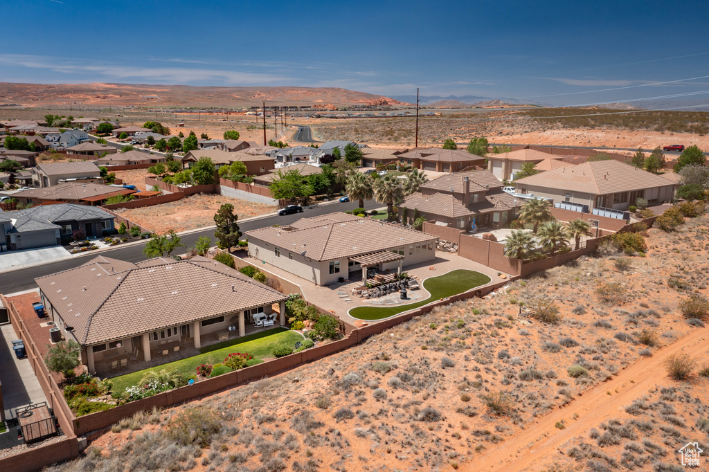 Aerial view of residential area with a mountainous background
