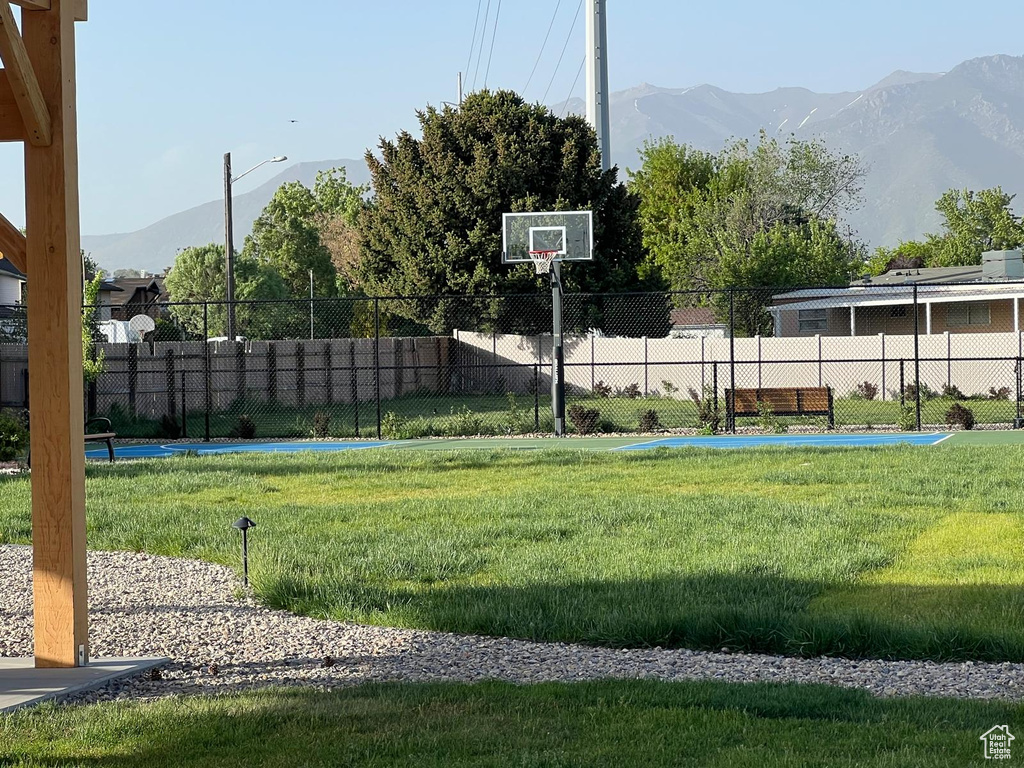 View of sport court featuring a mountain view and community basketball court