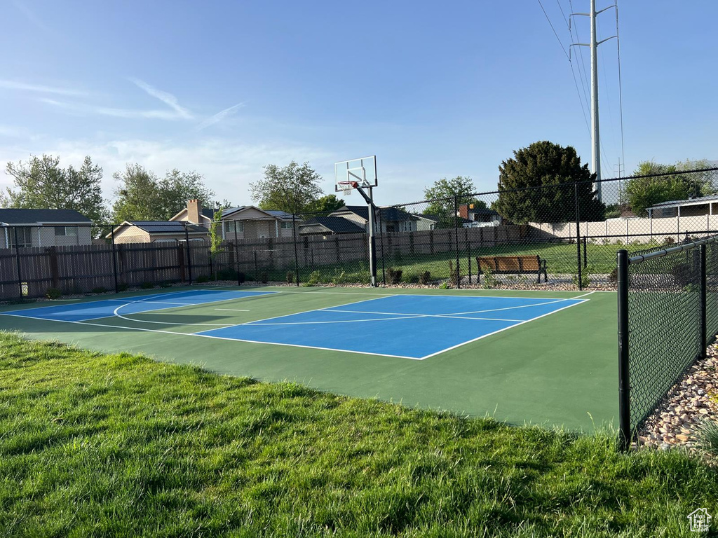 View of sport court featuring community basketball court