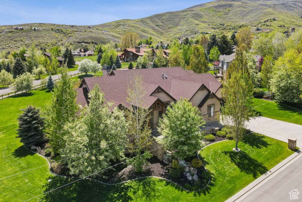 Aerial view of residential area with a mountainous background
