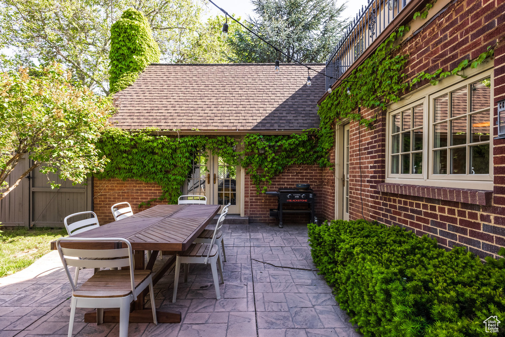View of patio / terrace featuring outdoor dining area and french doors
