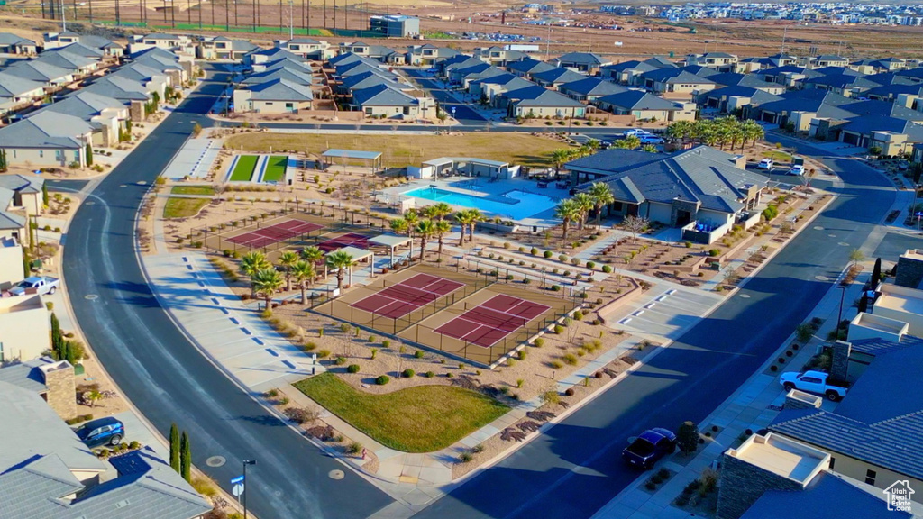 Aerial perspective of suburban area with a pool area