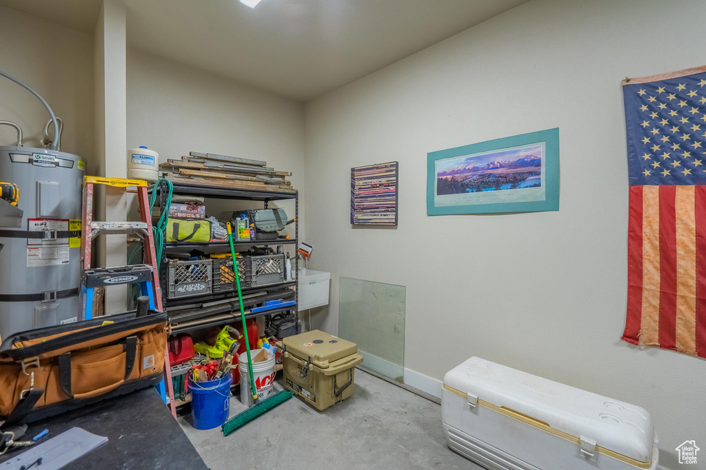 Storage area with electric water heater