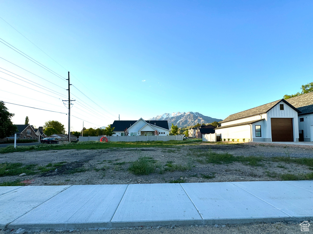 View of yard with a mountain view
