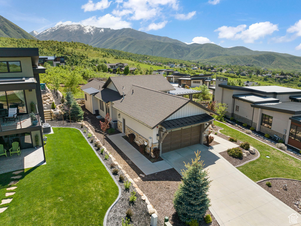 Aerial view of residential area with a mountain backdrop