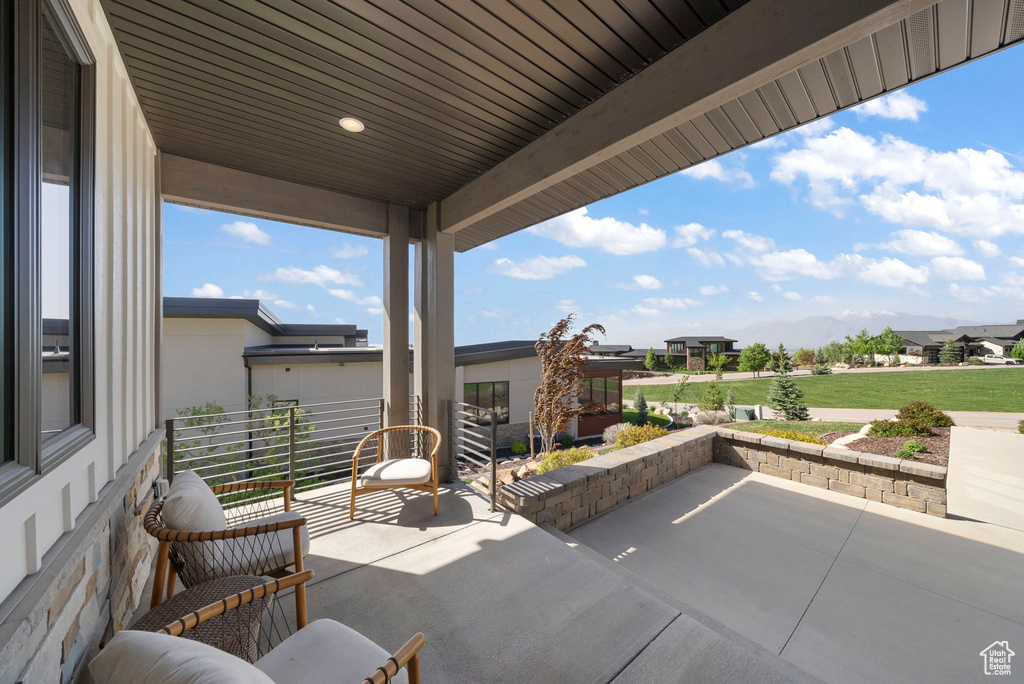 View of patio / terrace with a mountain view