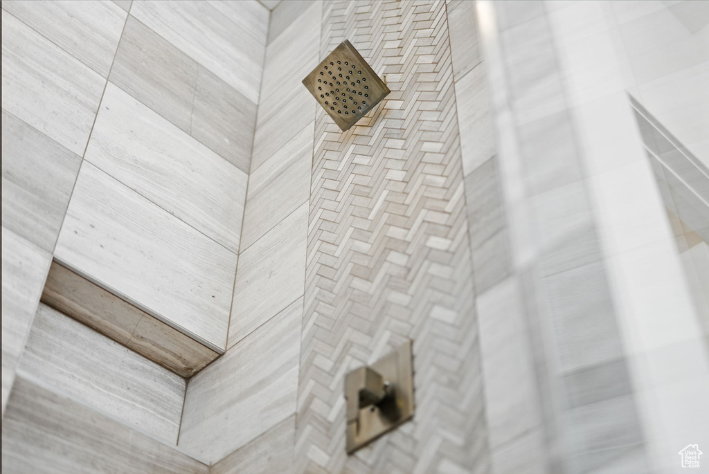 Bathroom view of a tile shower