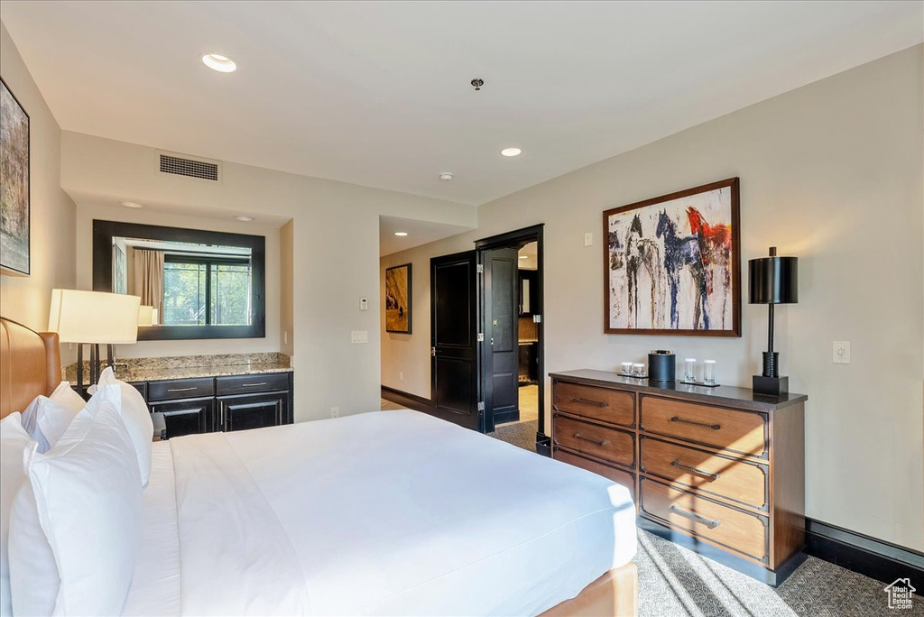 Bedroom featuring recessed lighting and baseboards