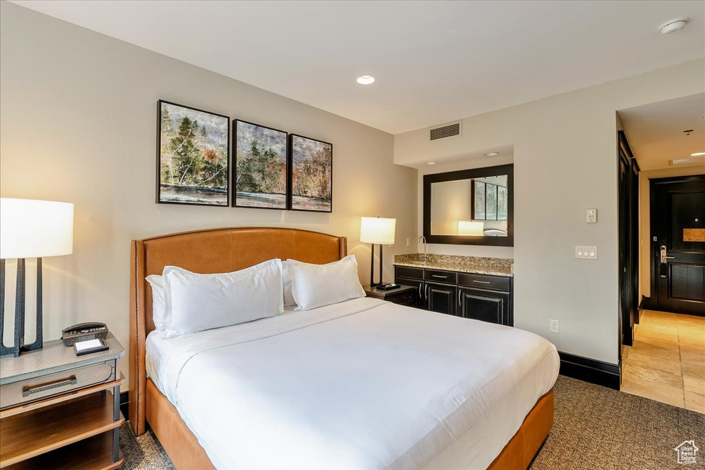 Bedroom with recessed lighting