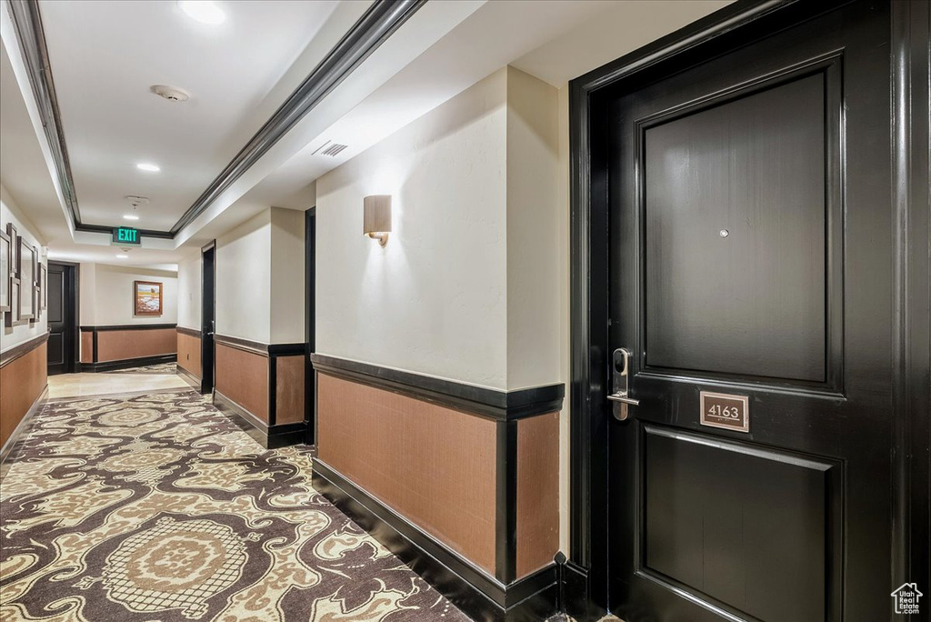 Corridor with a wainscoted wall