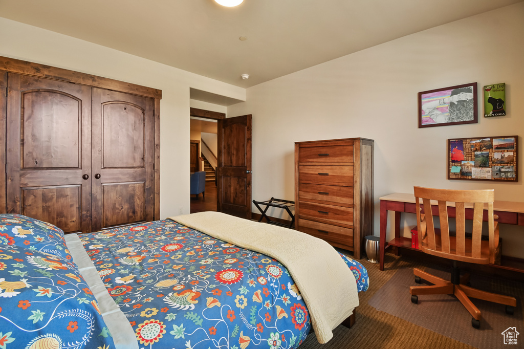 Bedroom featuring carpet floors