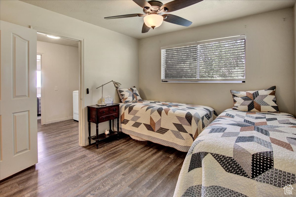Bedroom featuring wood finished floors and a ceiling fan