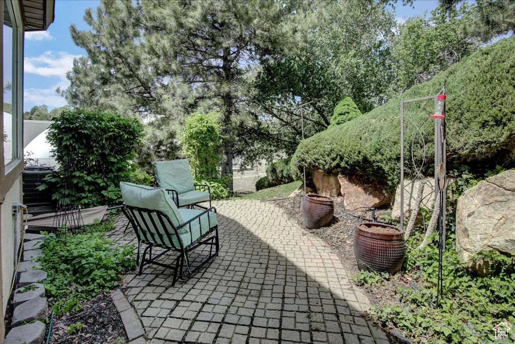 View of patio / terrace featuring central air condition unit