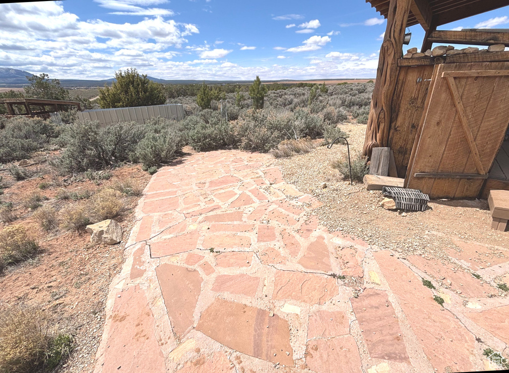View of patio / terrace featuring fence