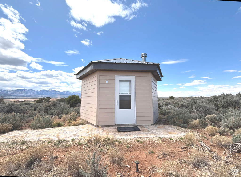 View of shed featuring a mountain view