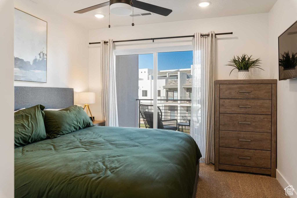 Carpeted bedroom with access to outside, baseboards, a ceiling fan, and recessed lighting