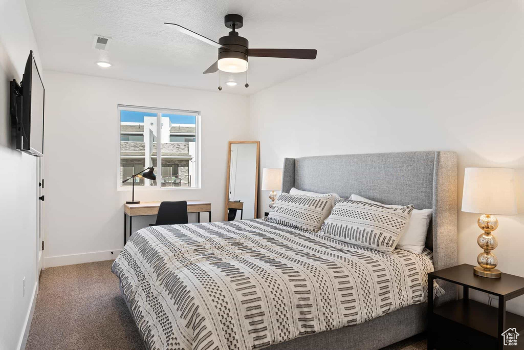 Bedroom featuring baseboards, carpet floors, recessed lighting, and a ceiling fan