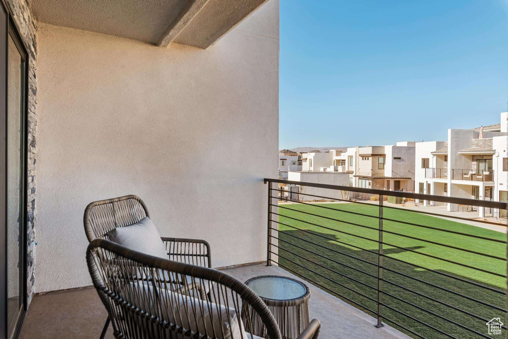 Balcony featuring a residential view