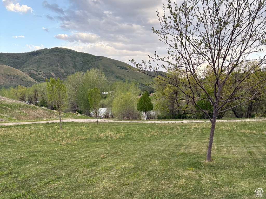 View of mountain background featuring rural landscape