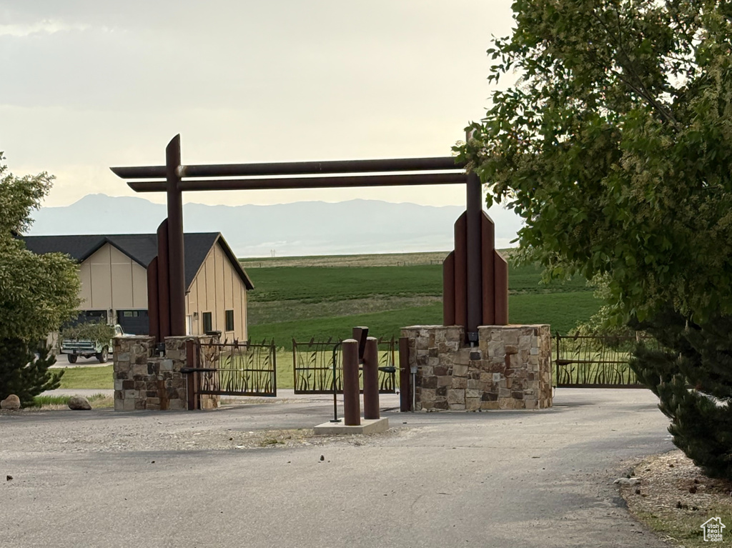 View of community featuring fence