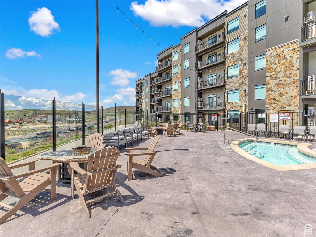 View of pool with fence