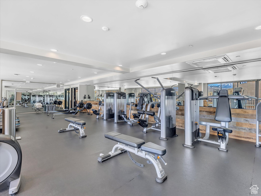 Workout area featuring recessed lighting