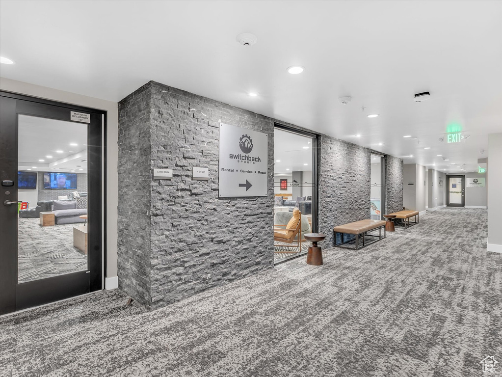 Community lobby featuring recessed lighting