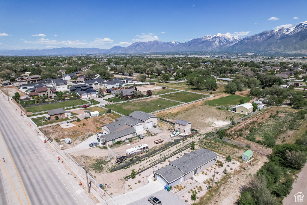 Aerial perspective of suburban area with a mountain backdrop