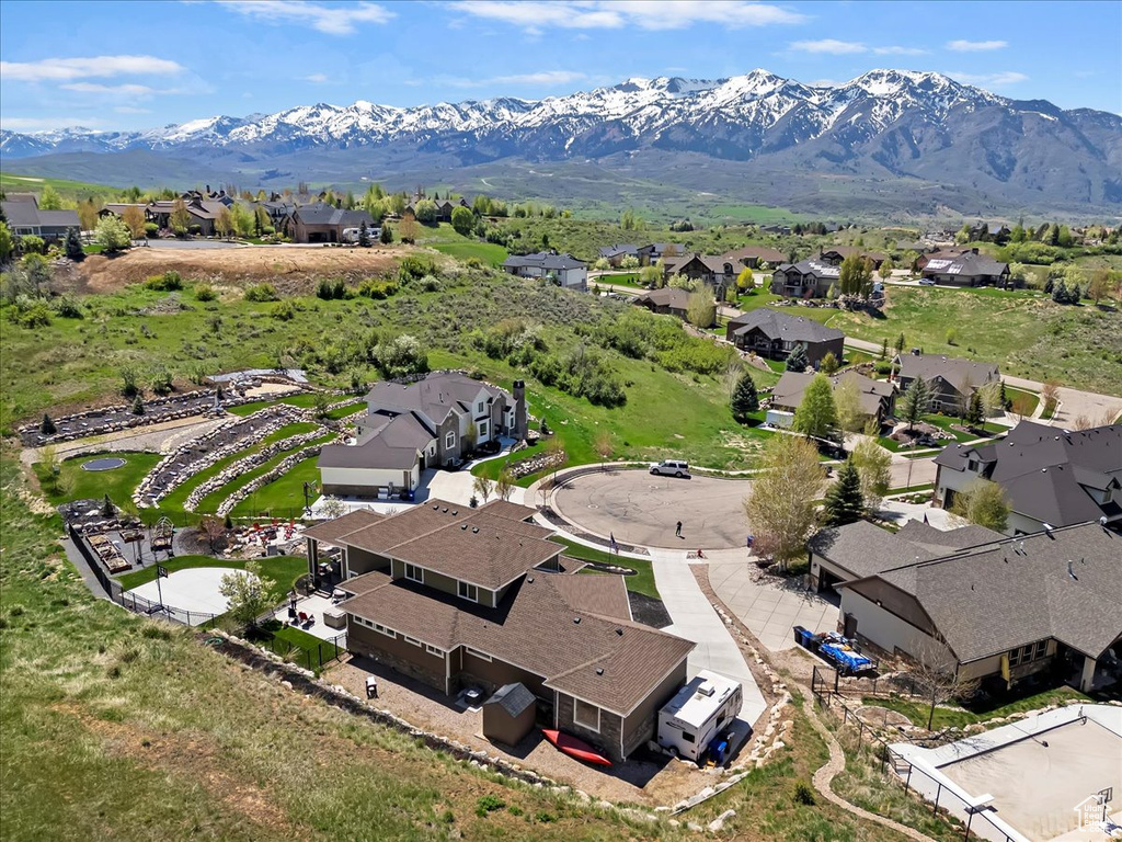 Aerial view of residential area with a mountain backdrop