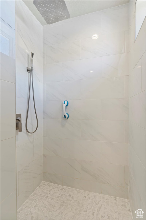 Bathroom with a tile shower