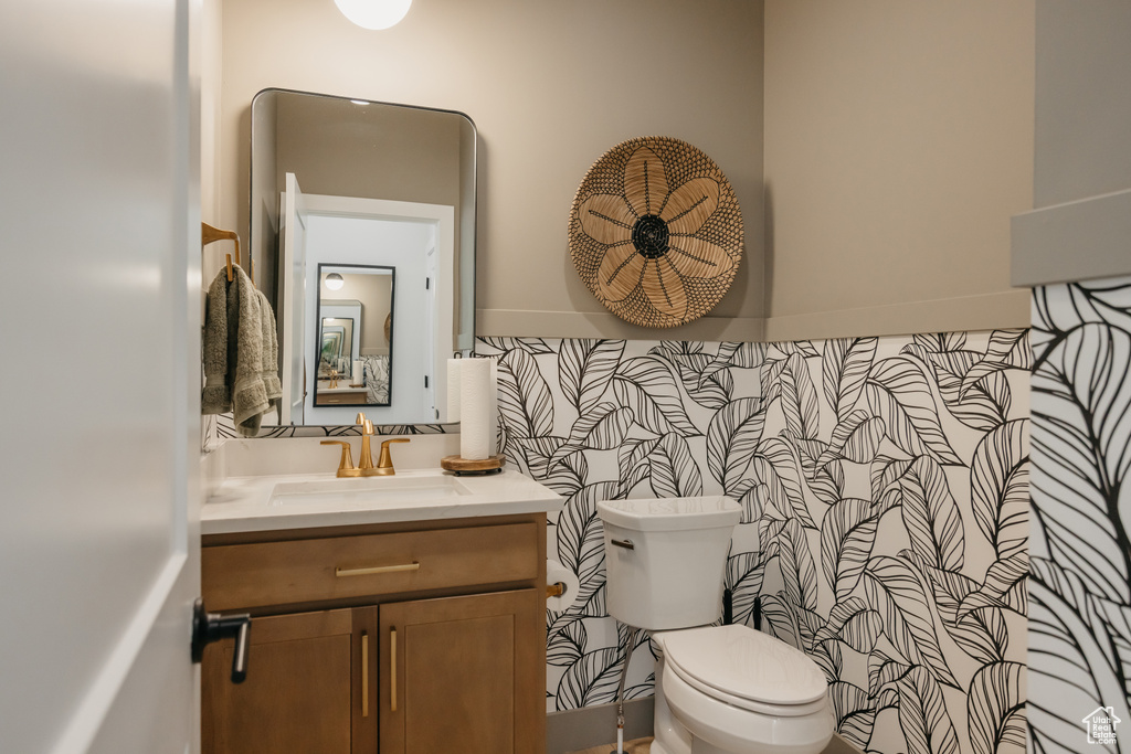 Bathroom featuring toilet and vanity